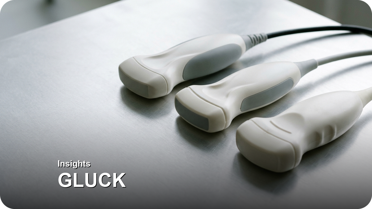 Executing Mid-Cycle Industrial Design Facelifts and OEM Brand Customizations Without Cutting New Exterior Molds — Three progressive ergonomic grip revisions of a handheld diagnostic probe housing in satin pearl-white and grey SLA resin — Concept Illustration (Not a Photograph of Delivered Client Parts)